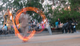 Fire dancer at Cape Phromthep