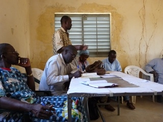 Tostan's National Coordinator in Mali tells CEP participants they have been invited to the grand event.