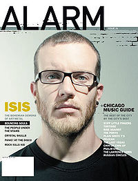 [200px-Aaron_Turner_on_the_cover_of_Alarm.jpg]