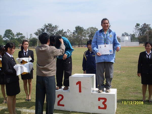 รับเหรียญรางวัล