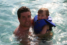 Spence swimming with Daddy