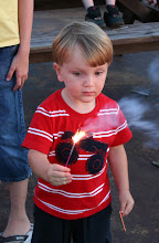 Spence was pumped about his sparkler until he decided to touch it:(