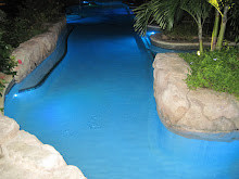 The lagoon lit up at night in front of our room