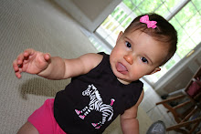 She was always sticking her tongue out playing with her new teeth