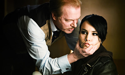 Peter Andersson and Noomi Rapace in The Girl With the Dragon Tattoo