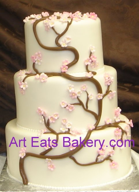 Three tier round fondant custom cherry blossom wedding cake