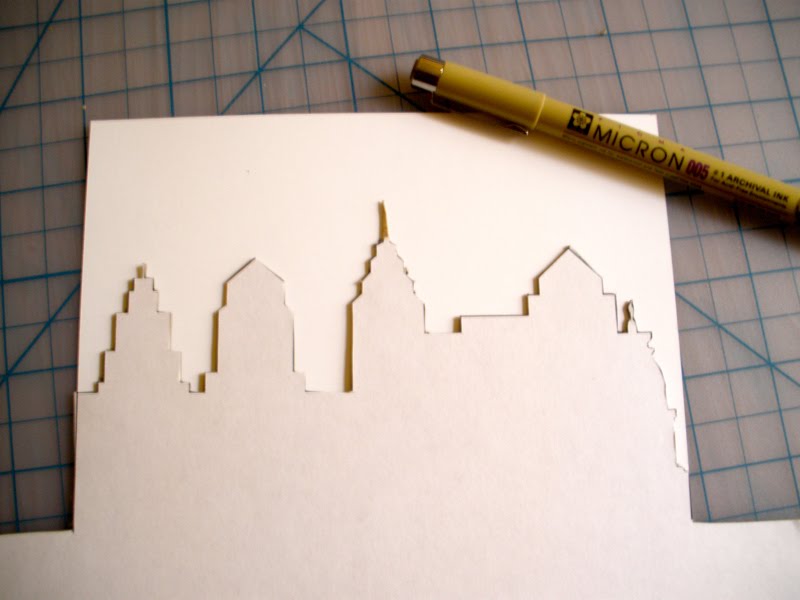 Place the skyline stencil on