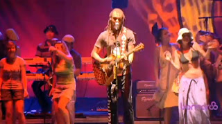 Michael Franti performing “Say Hey (I Love You)” at the Bonnaroo Music & Arts Festival in Manchester, Tennessee, June 10, 2010