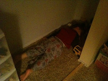 Tristan asleep in his closet