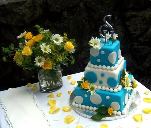 wedding cakes with blue and black accent