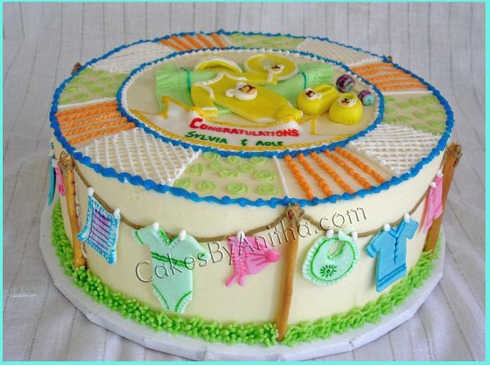 Cakes by Anitha Baby clothes Baby shower cake