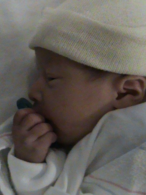 I can hold my pacifier like the big kids do