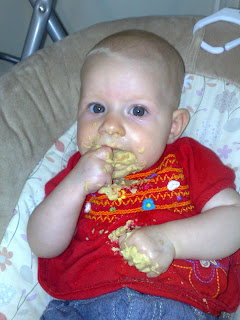 Baby eating spreads