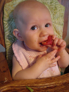 Introduce baby to solid strawberry