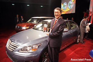 Hyundai’s Dr. Hyun-Soon Lee, next to the Genesis