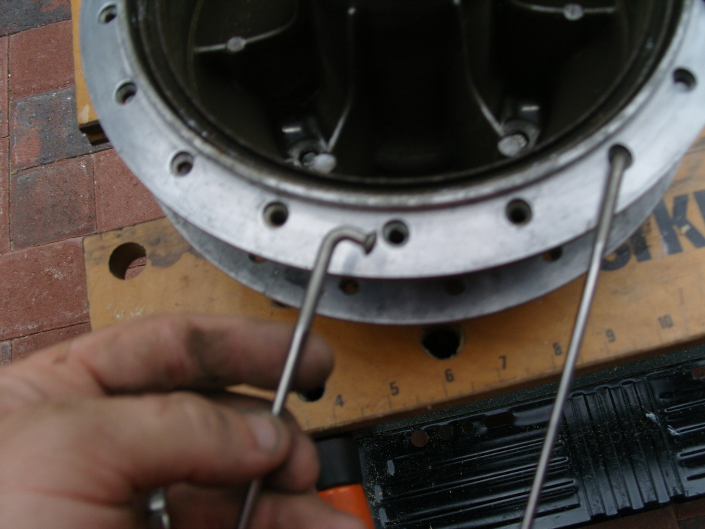 begin lacing hub with most angled spokes