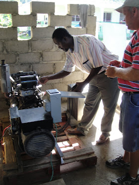 Pastor Wiljean starts up the generator