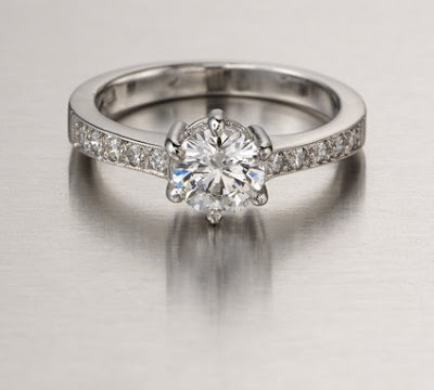 solitaire ring with small