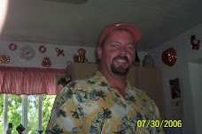 my dad he lives far away and wen i get to see him we spend r day playing foot ball and video games