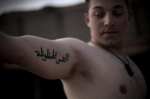It's titled Soldiers' Tattoos in Marjah, and is by Mauricio Lima.