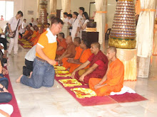 Offerings of ang pows to the buddhist monks