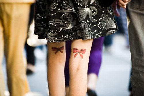 The bow tattoo is becoming a popular feminine inked choice