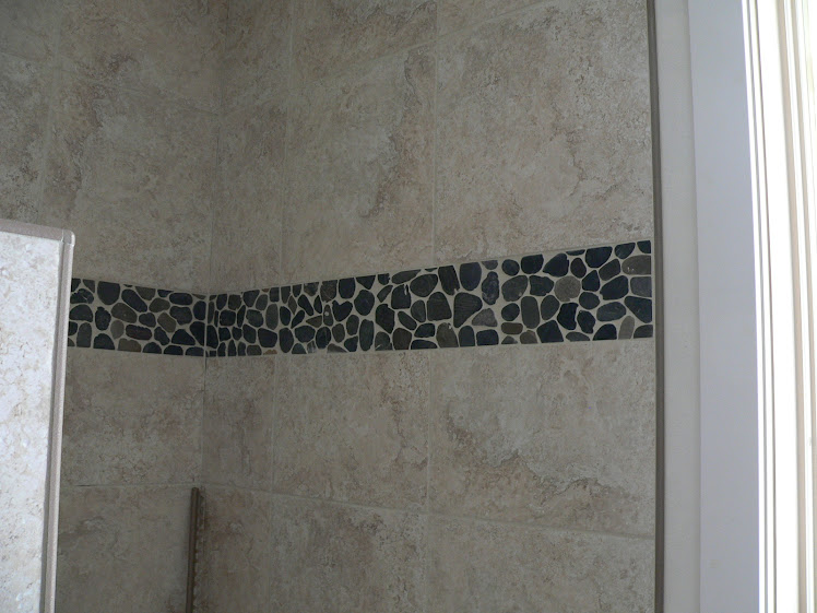 Jan 29 - Pebble Tiles in the Master Bath Shower