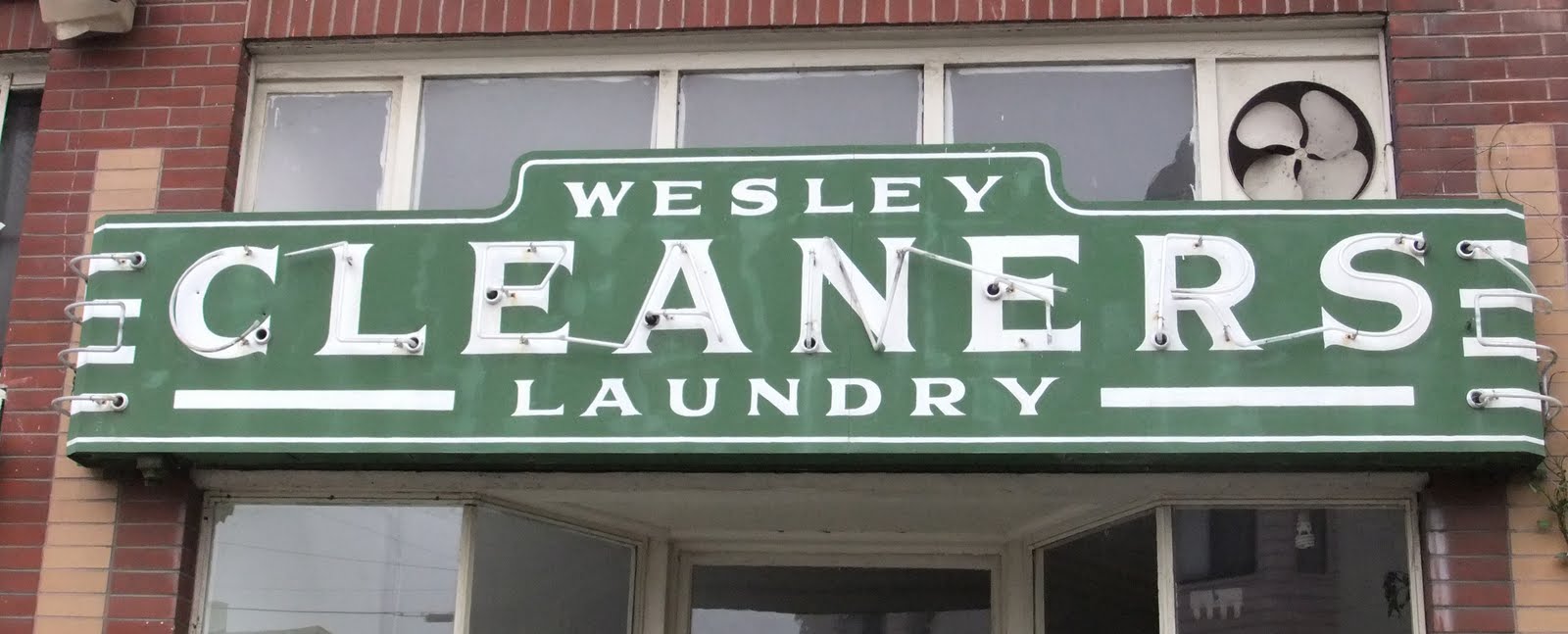 Our Oakland signs Wesley Cleaners