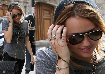 miley cyrus tattoo just breathe. the phrase quot;just breathequot;