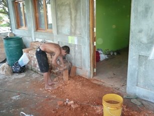 Edwin2 shaping bricks.