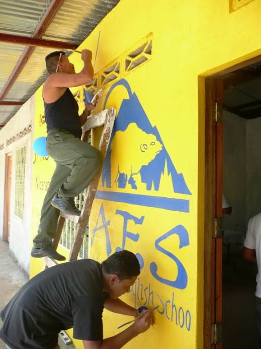 Painting the new school--everything done by hand