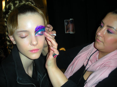  makeup look, while her locks were voluminous and cascaded down her back.