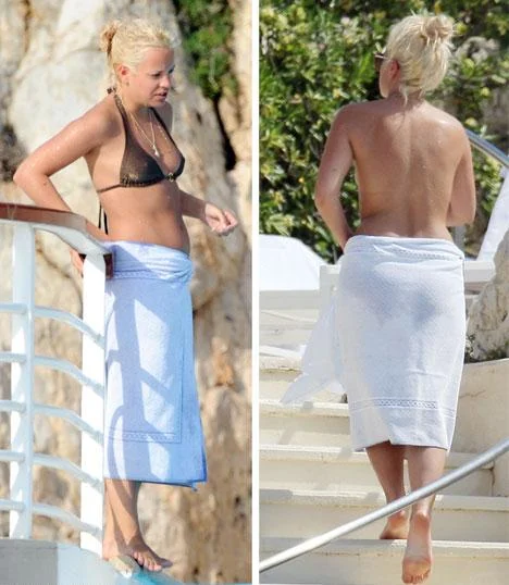 Lily Allen spotted frolicking in a water without her top