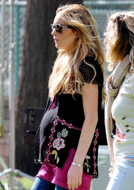 Lindsay Lohan with a bulging baby bump