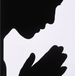 girl praying silhouette