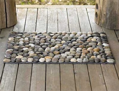 bath mat made of real river stones from Vivaterra.com, an eco products site