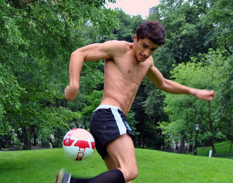 Cute shirtless footie player in short shorts.