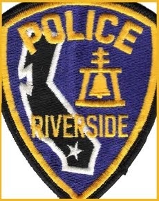 riverside police ca detective behind wall blue