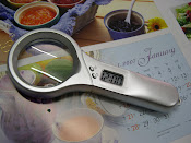 magnifying glass with clock