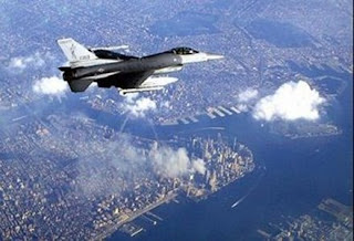 An F-16 Falcon flies over New York, September 12, 2001