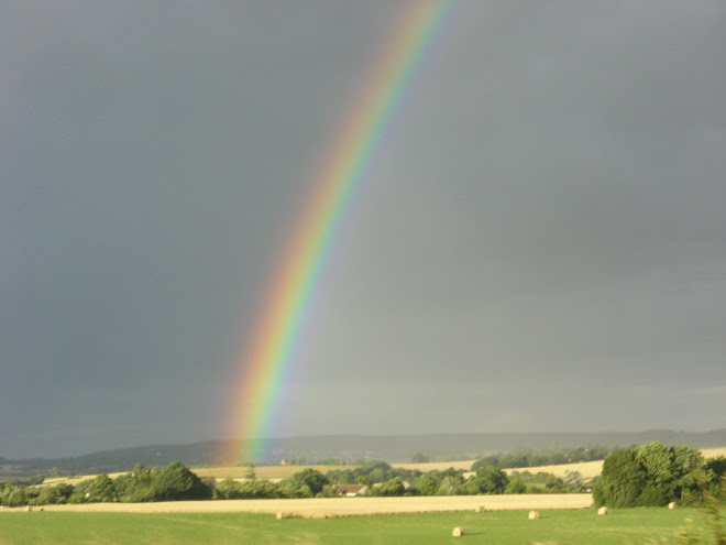 Amazing huge full rainbow that led us to Chartres. I never seen a rainbow touch the ground before.