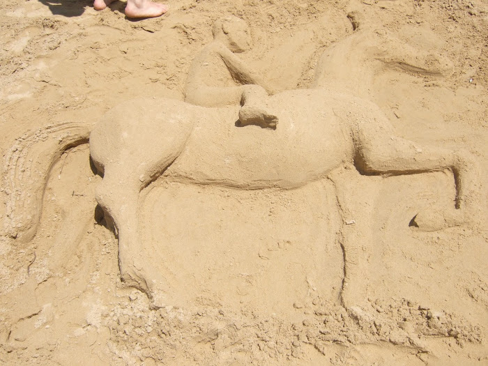 scultura di sabbia (BIMBO SUL CAVALLO) Rodolfo Orecchio