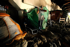 homeless vagrant under an LA bridge