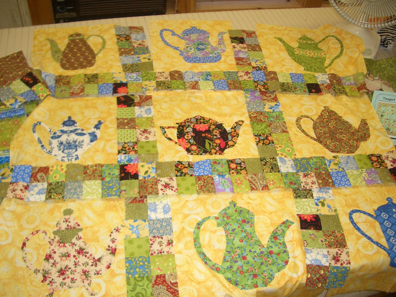 Colleen's "Quilting Journey to Oz" New project machine applique Teapot