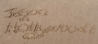 Jason in Hollywood logo in the sand