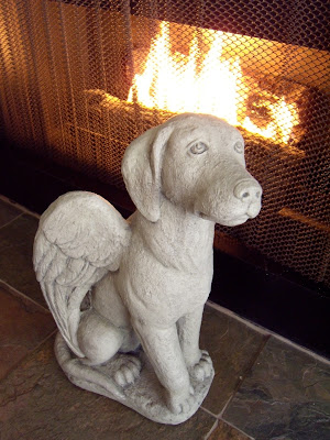 Angelic dog statue