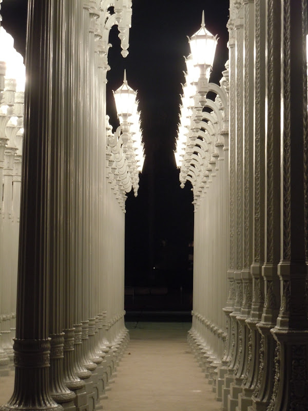Inside Urban Light at night LACMA