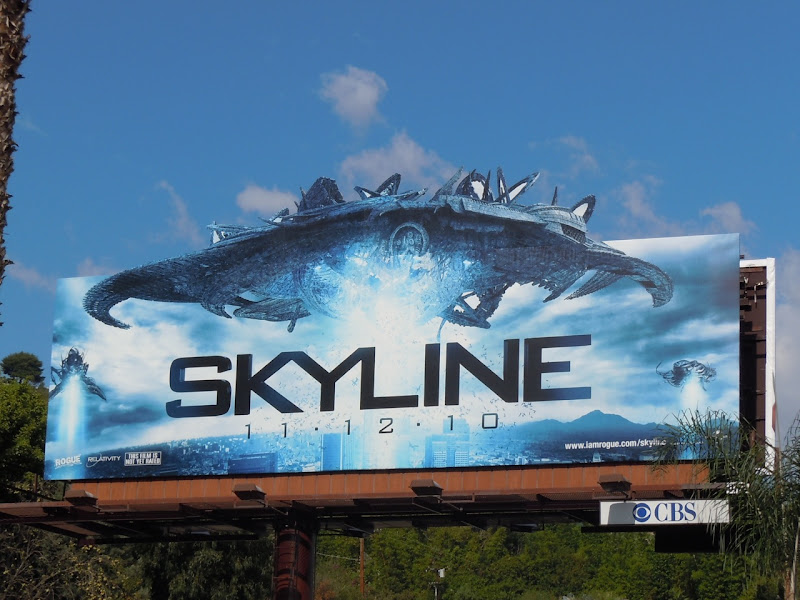 Skyline spaceship movie billboard