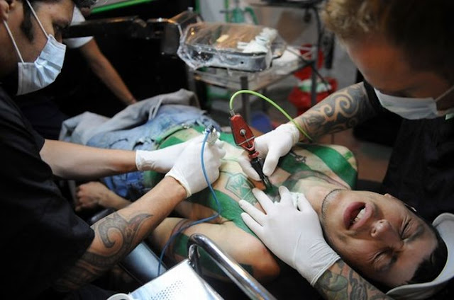  Felipe Alvarez has been tattooed with a soccer jersey tattoo of Atletico 