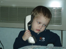 Noah on the phone with nana and pawpaw